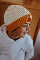 muts curry grandma gebreid hellohossy beige oker geel kindermuts